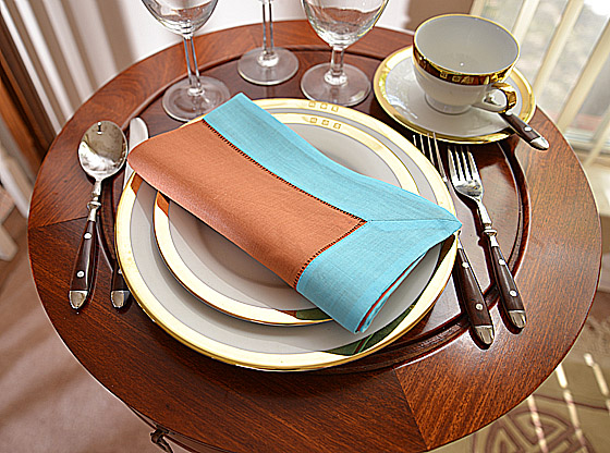 Hemstitch Dinner Napkin, 18", Burnt Orange with Aqua border.