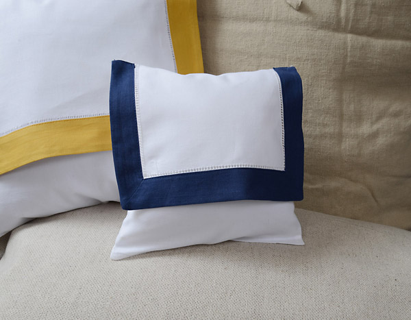 Hemstitch Baby Size Eenvelope 8x8" with Navy border.
